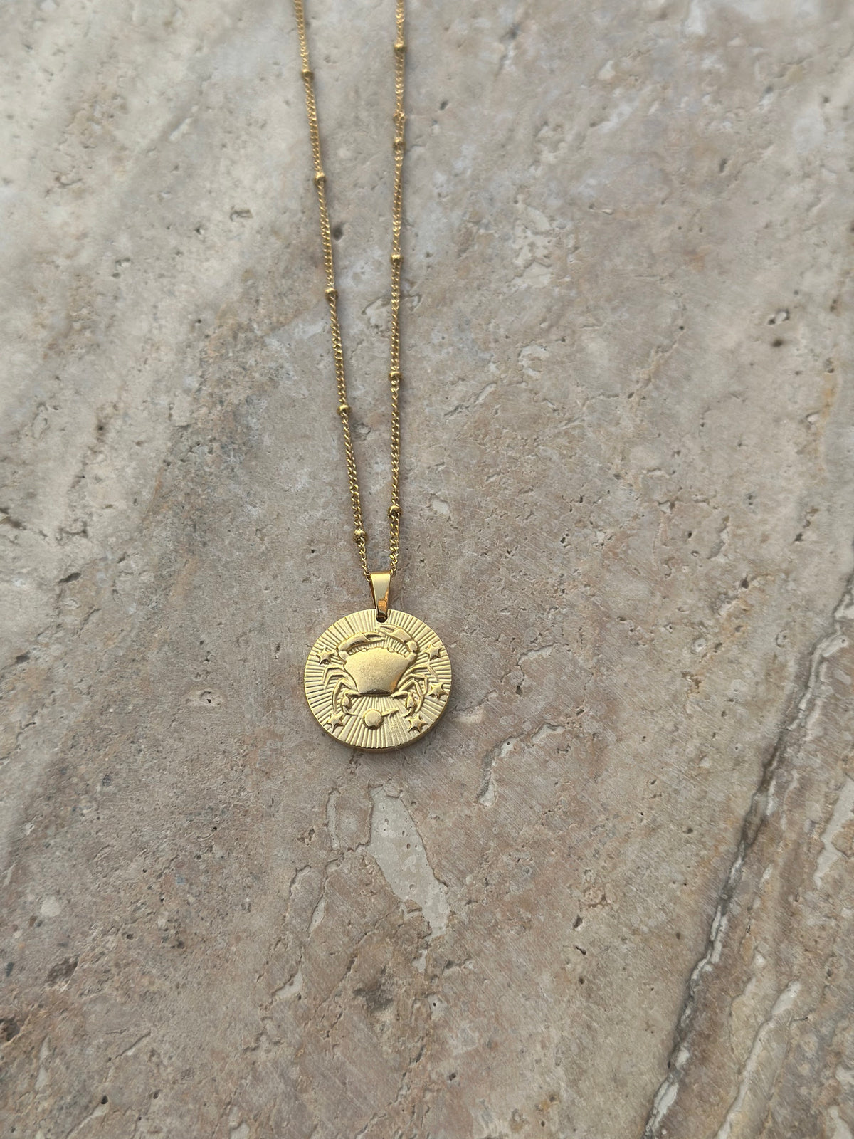 Gold zodiac coin pendant necklace, view 10