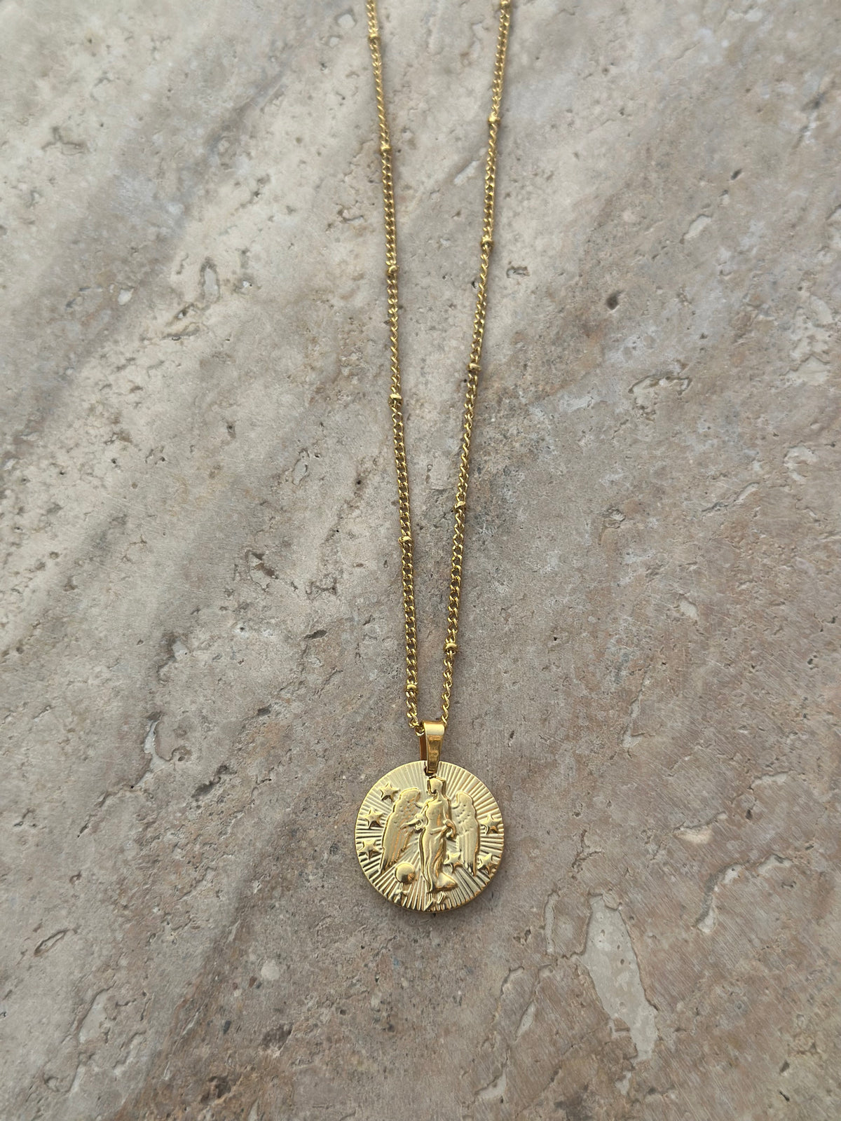 Gold zodiac coin pendant necklace, view 6