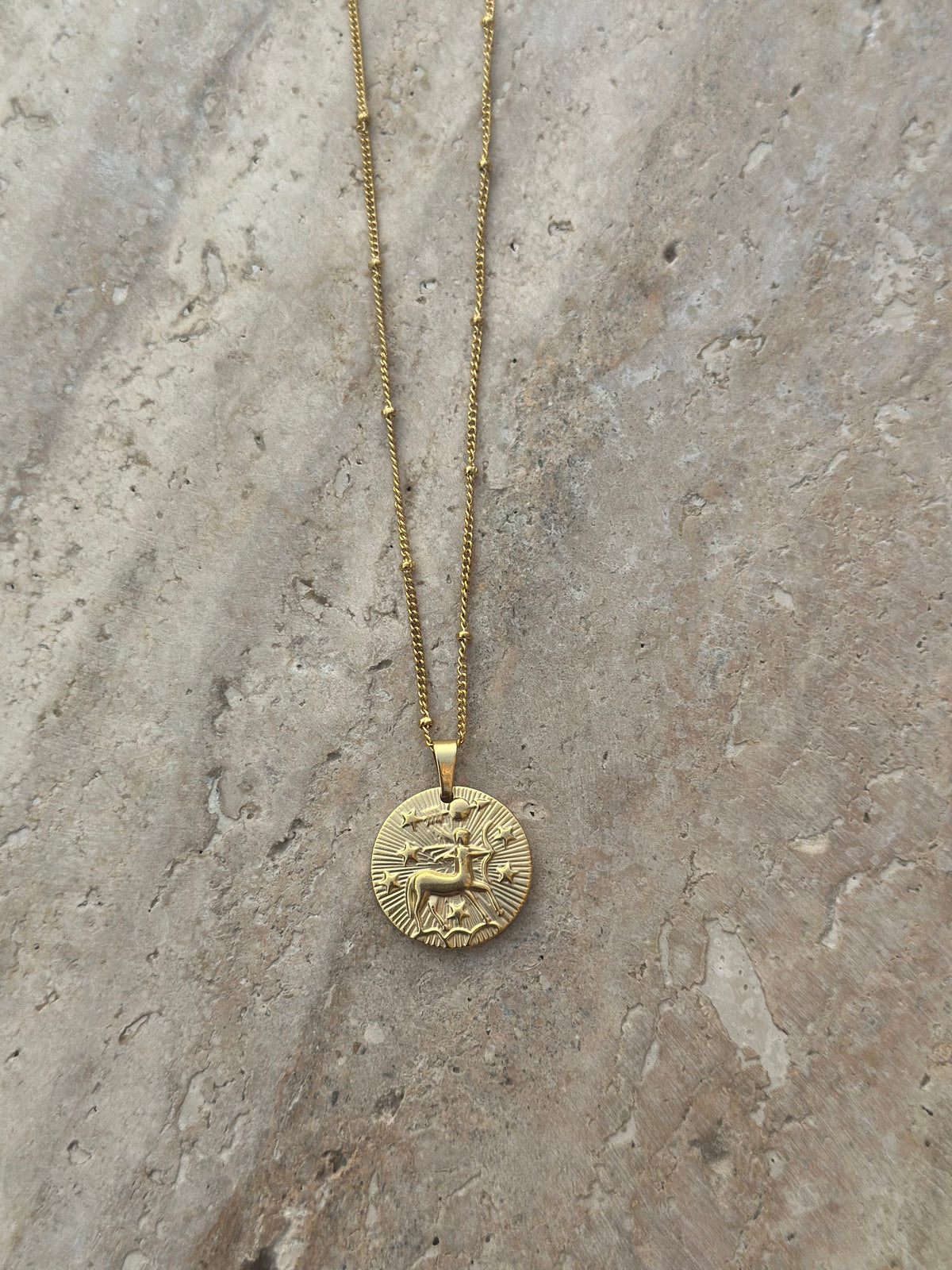 Gold zodiac coin pendant necklace, view 11