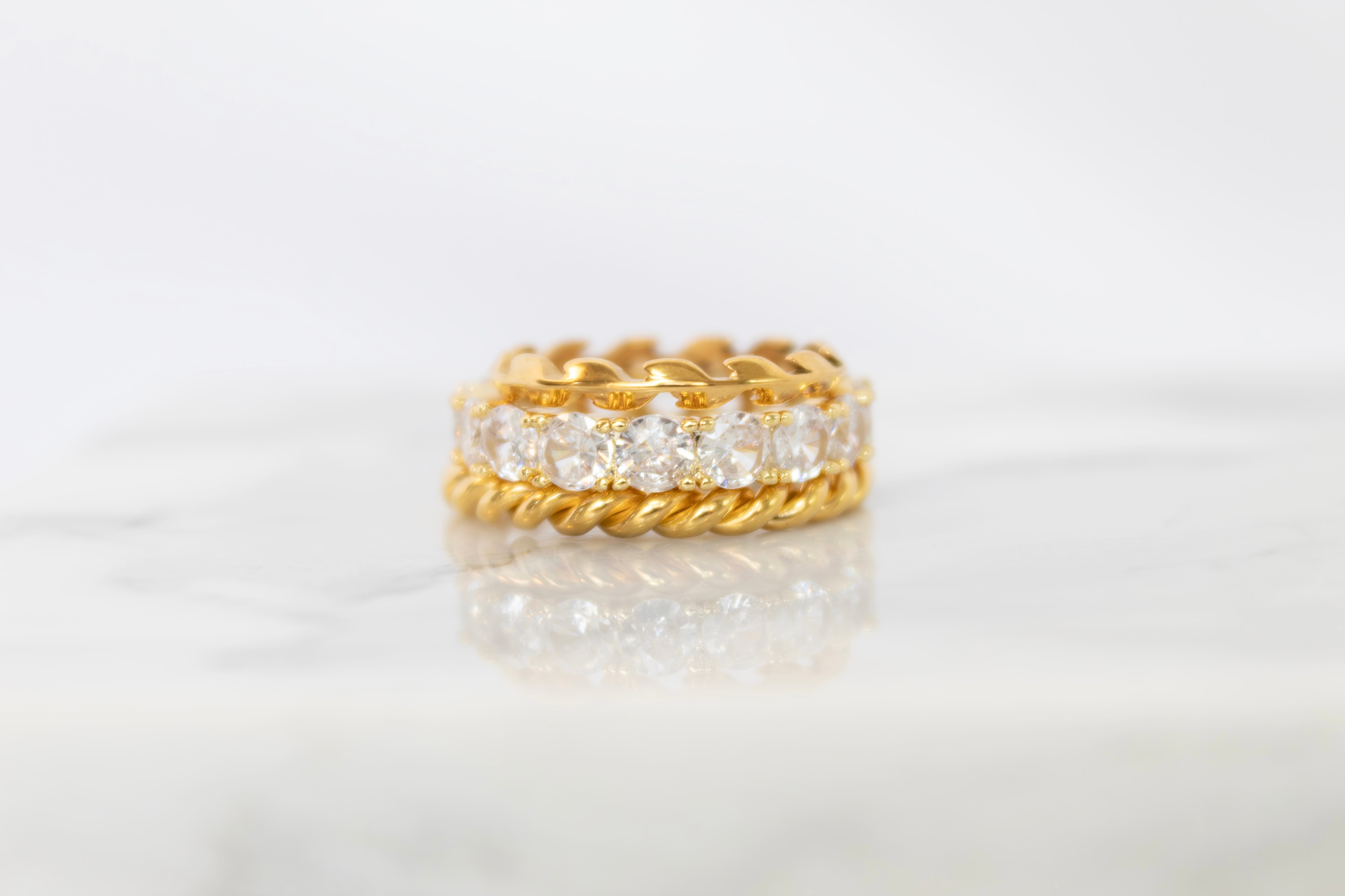 18k gold rings stacked