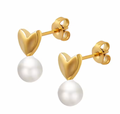 A pair of gold heart stud earrings with white pearl drops, bridesmaid earrings