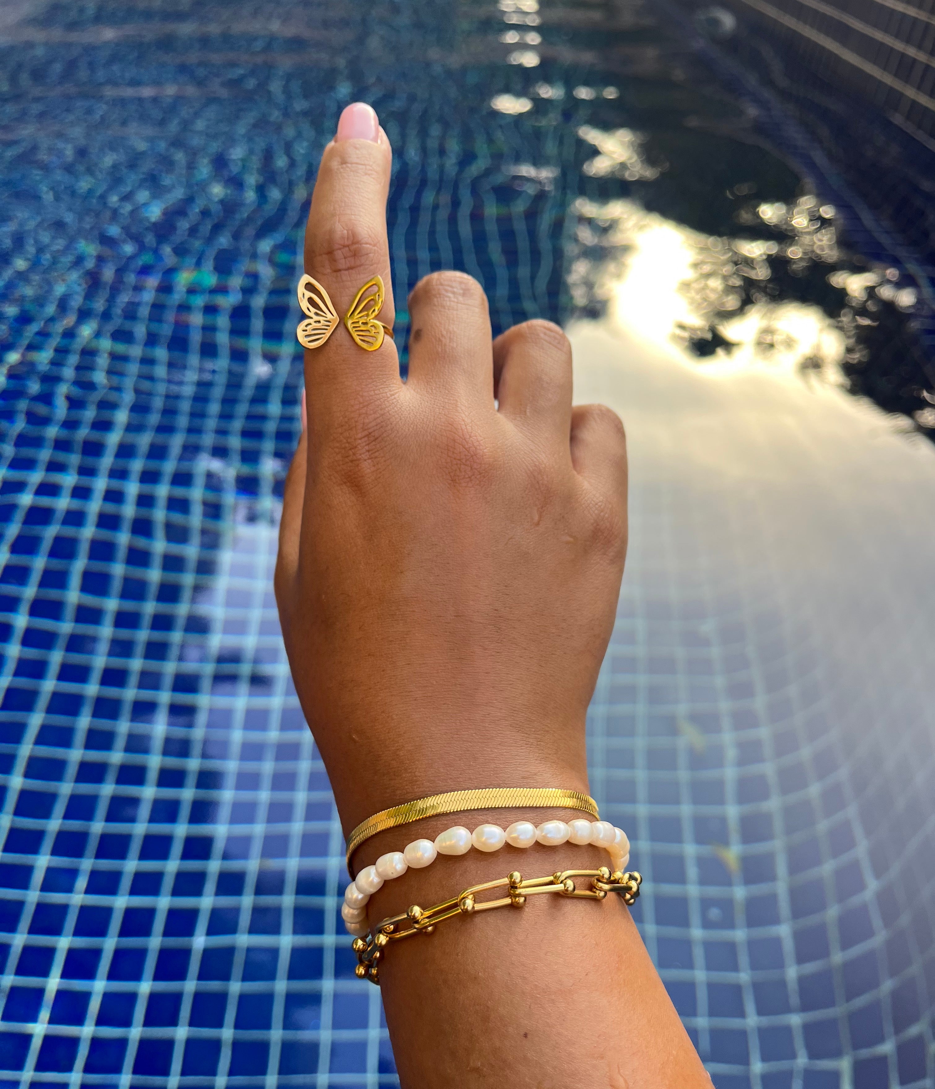 water resistant butterfly ring and pearl beaded bracelet