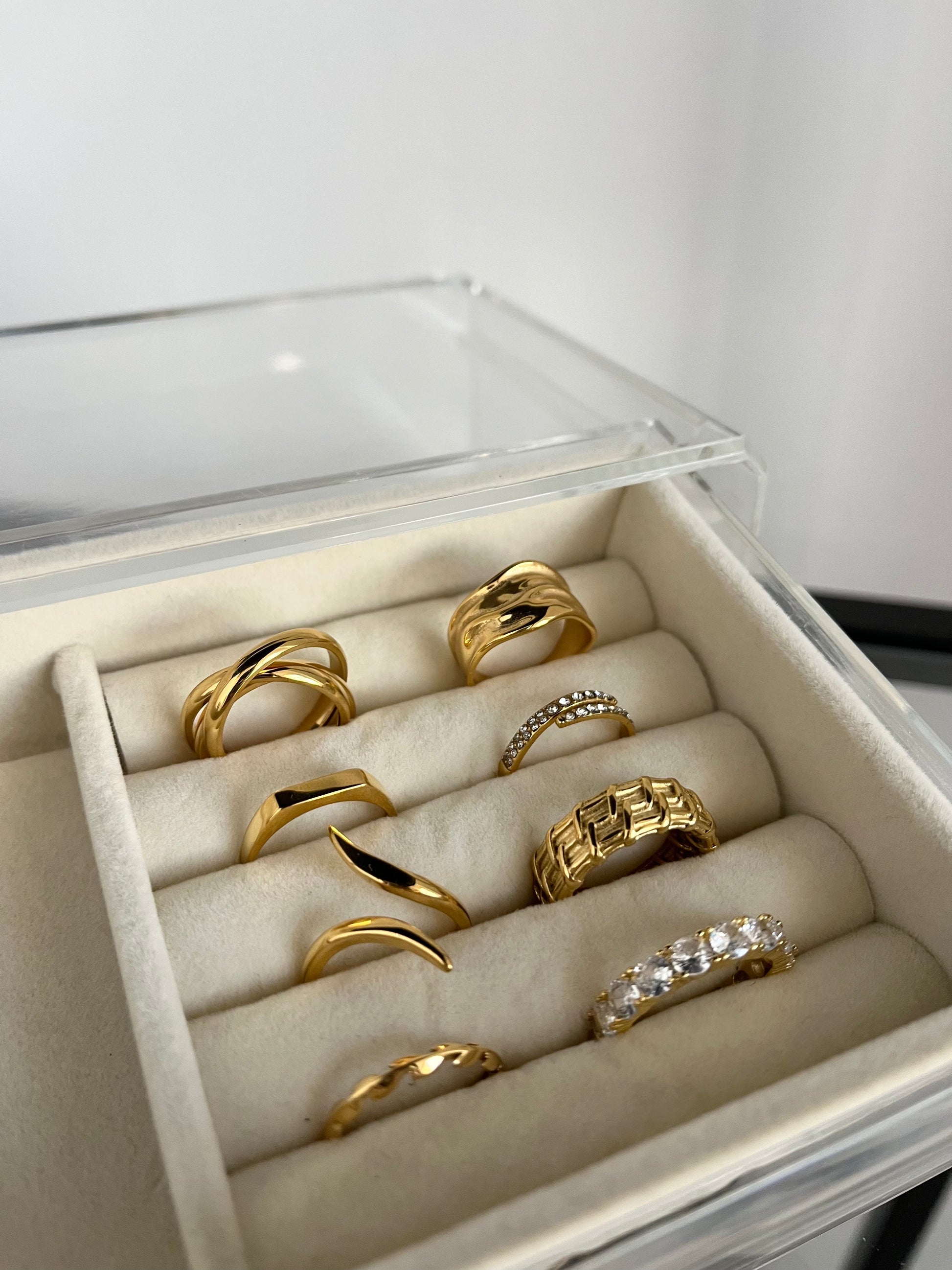 collection of modern gold plated rings 