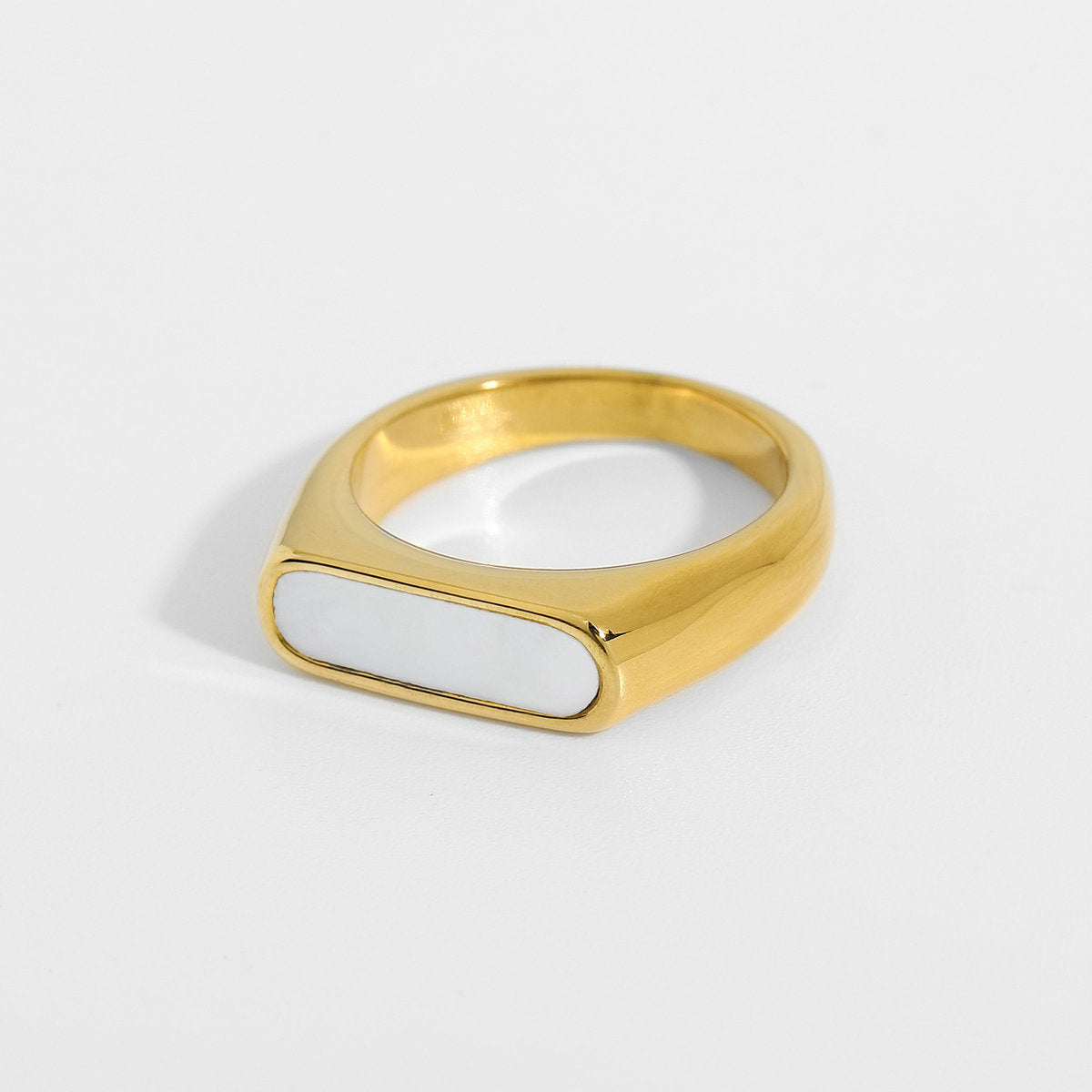 white resin gold ring